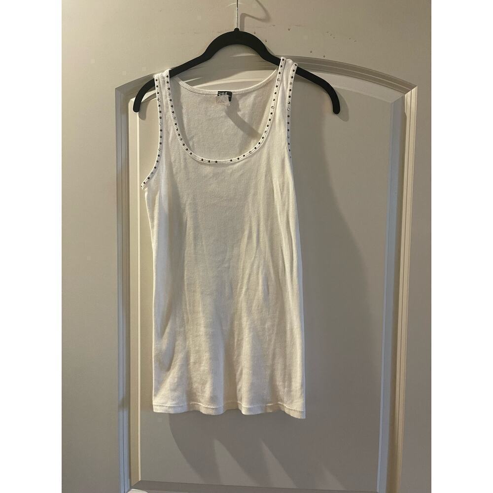 Top while embellished around neckline $30. Size large